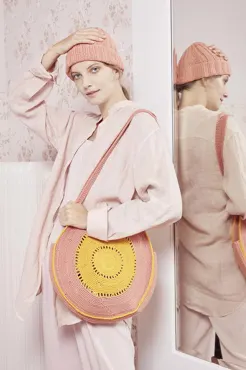 Mütze aus WOOLADDICTS HAPPINESS